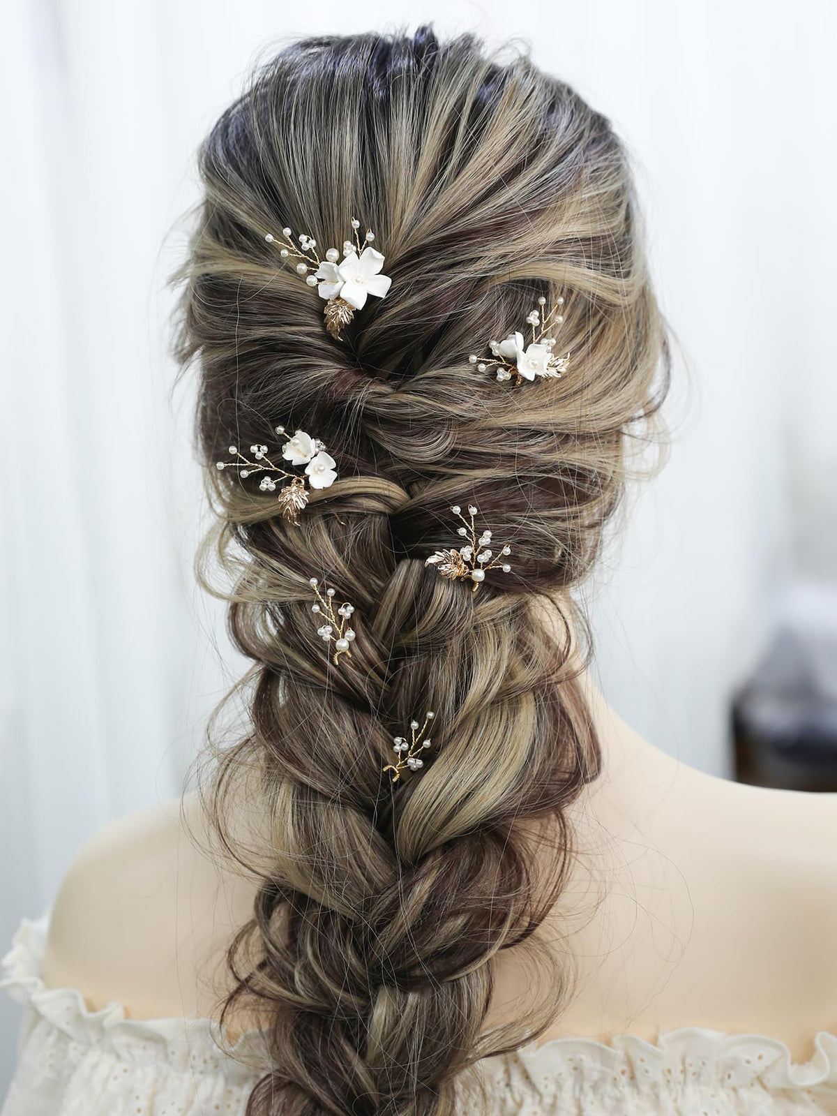 SELFCLOUD hair pins inserted in bridal updo demonstrating secure hold