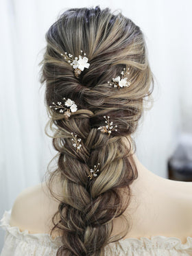 SELFCLOUD hair pins inserted in bridal updo demonstrating secure hold