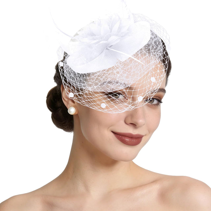 Semato front view of white fascinator showing elegant silhouette and balance
