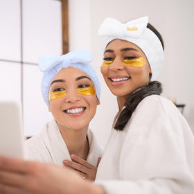 Semato headband beside ruler demonstrating stretch fit up to 13.78 inches
