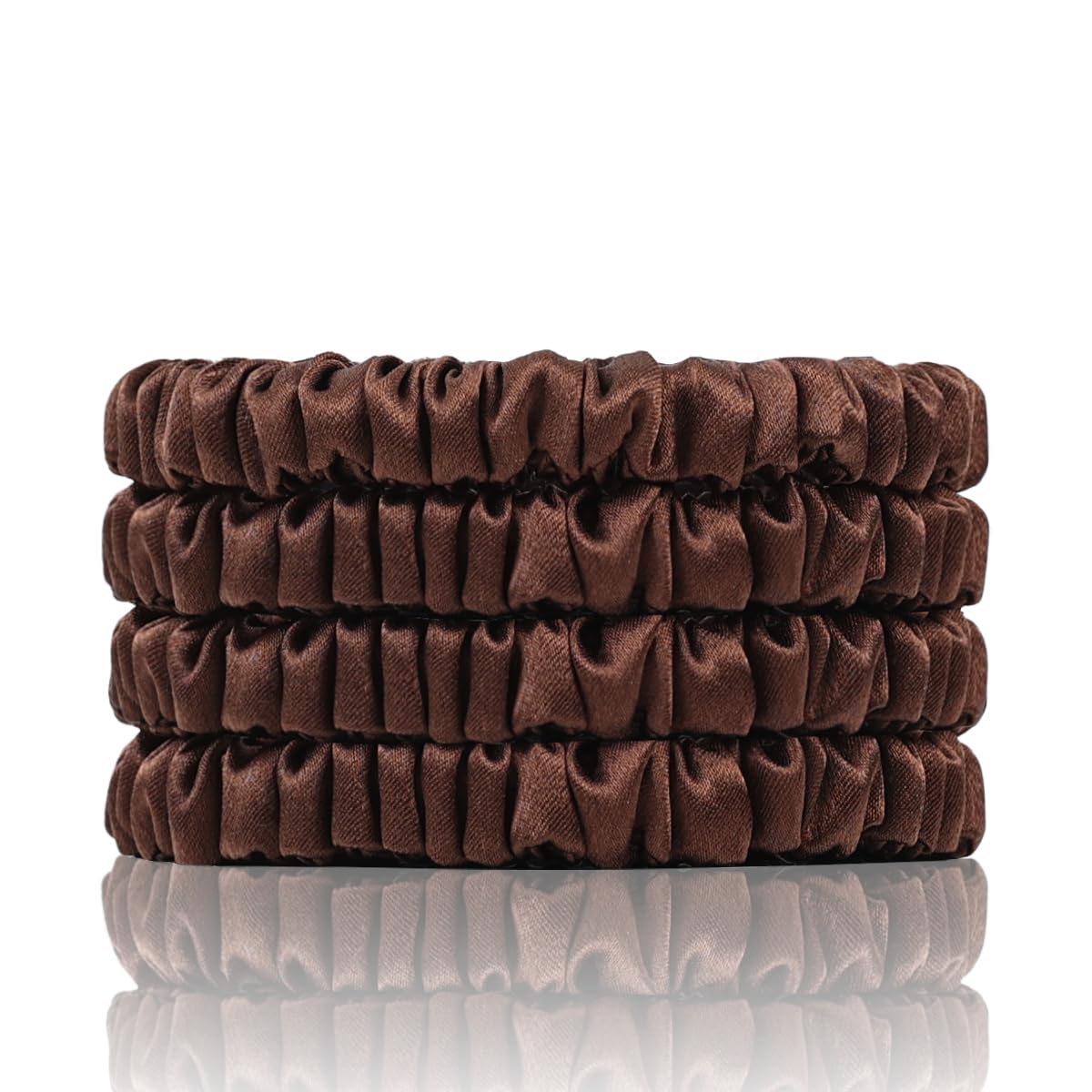 SEMRUE front packaging showing four brown silk scrunchies, polished presentation and care