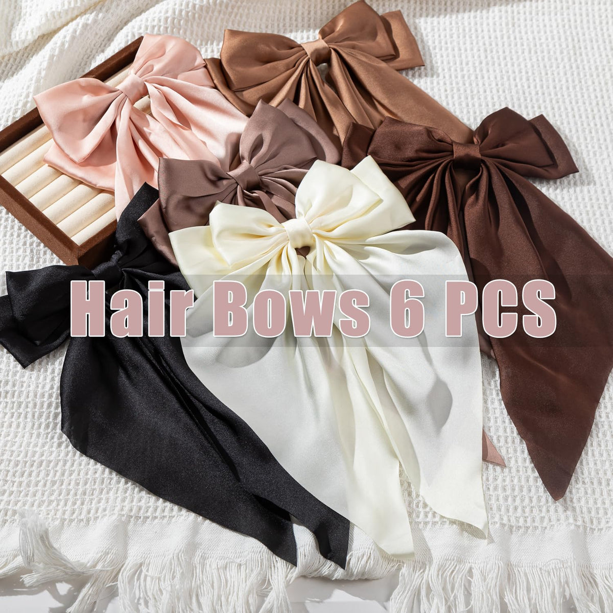Seneeel bow worn in ponytail adding instant style and grip