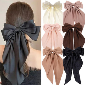 Seneeel bow in a party hairstyle showing polished event-ready look