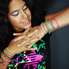 Senkary bracelets arranged as party favors showing bright event-ready colors