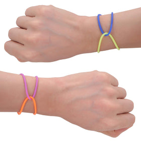 Senkary bracelet beside coin illustrating size and scale for fit