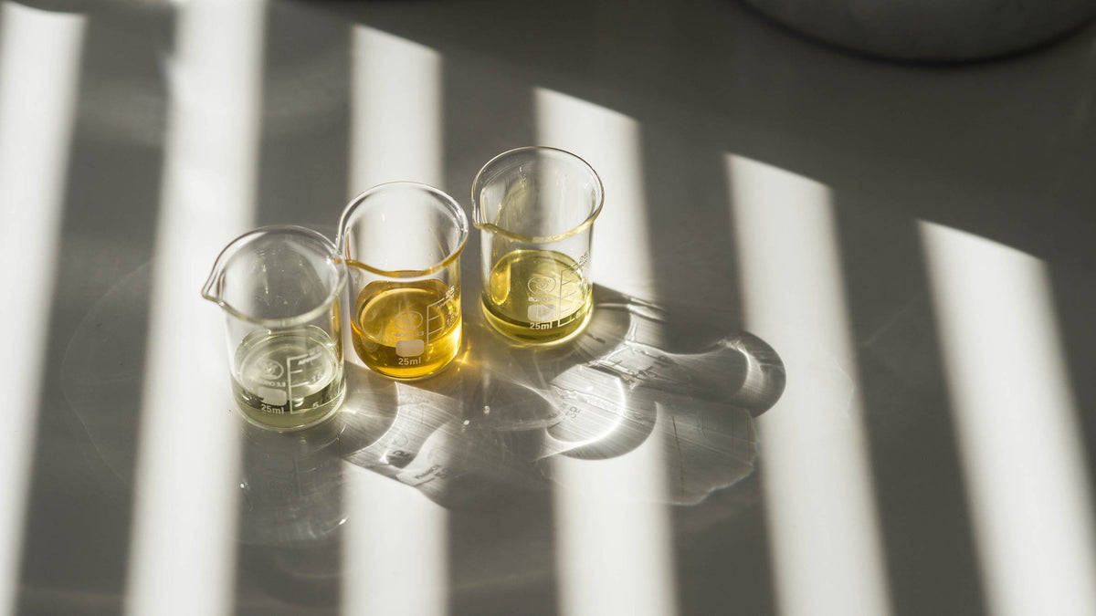 Senteurs d'Orient oil dispensed on hand demonstrating lightweight texture and quick absorption