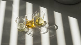 Senteurs d'Orient oil dispensed on hand demonstrating lightweight texture and quick absorption