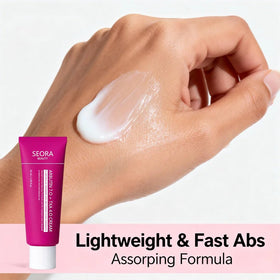 Seora Beauty cream on fingers ready to apply for smooth skin