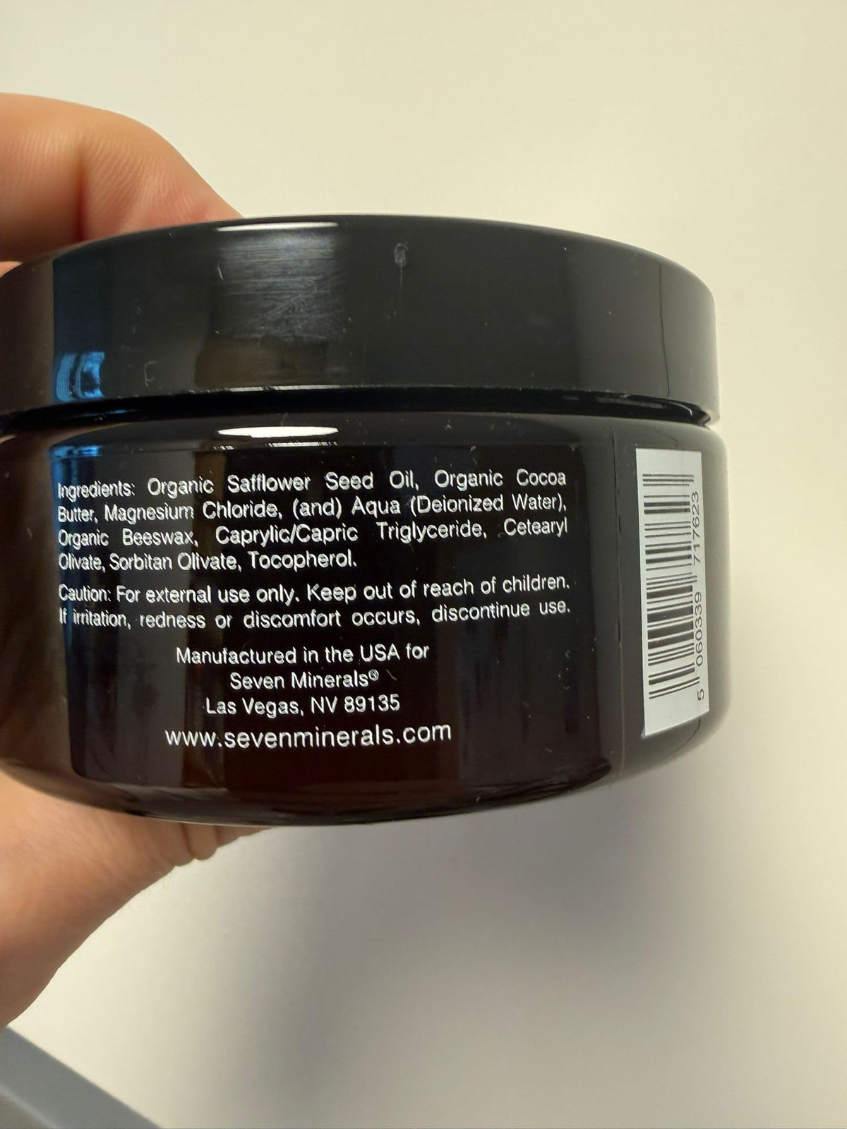 Seven Minerals applying cream on arm demonstrating fast absorption benefit