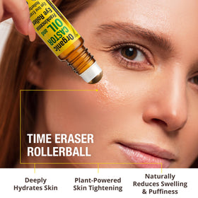 Seven Minerals eye roller next to coin showing compact travel-friendly size