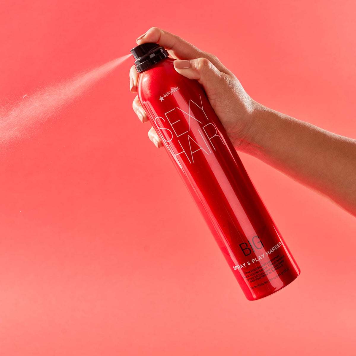 SexyHair Big Spray & Play travel-size next to passport, compact TSA-friendly styling on the go benefit