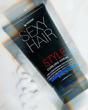 SexyHair curling crème on bathroom shelf in lifestyle scene, suggests everyday convenience