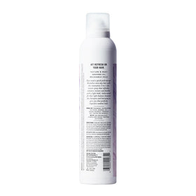 SGX NYC on model outdoors showing natural volume and long-lasting freshness