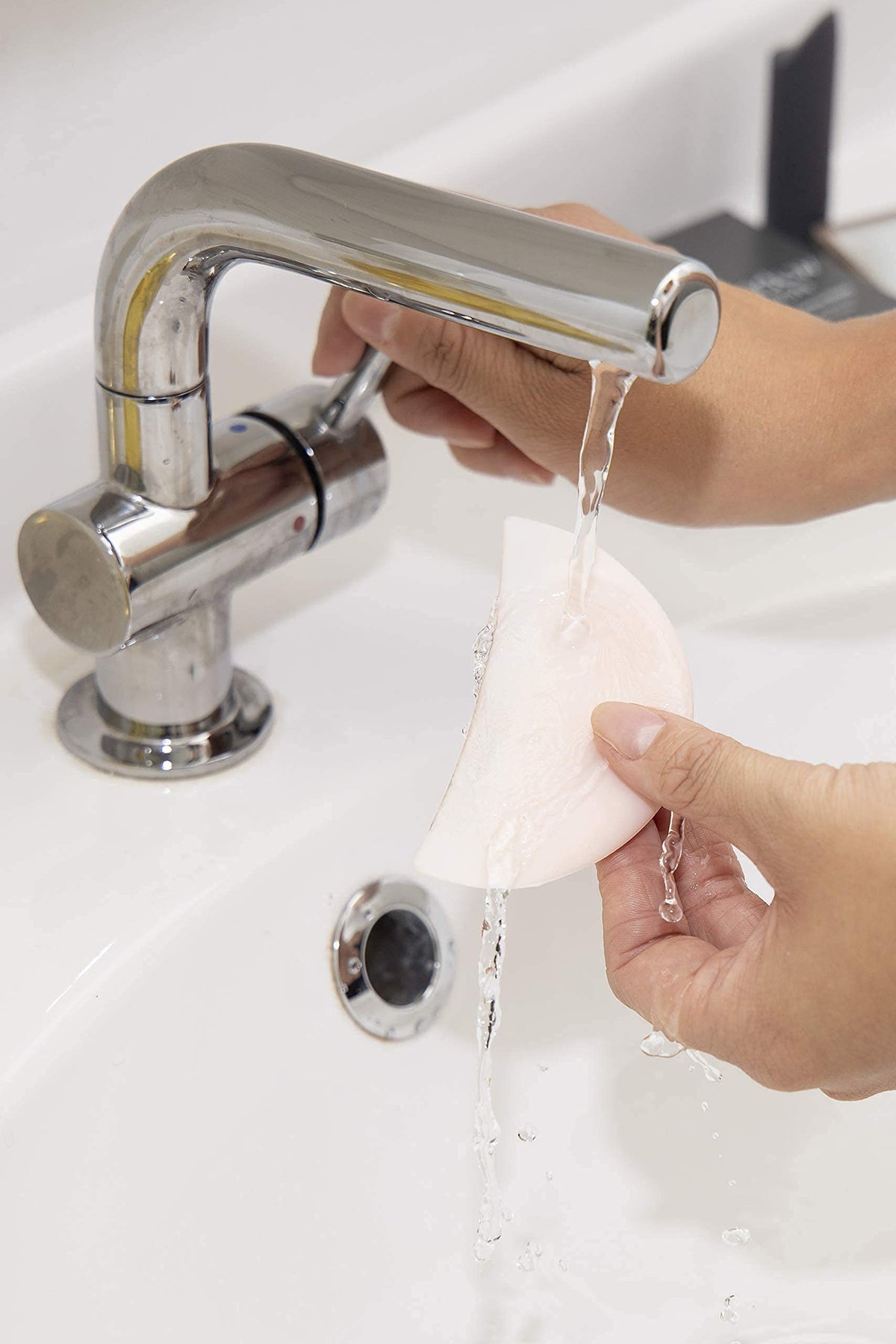 ShadowMoon cooled in hand showing under-eye soothing and depuffing comfort