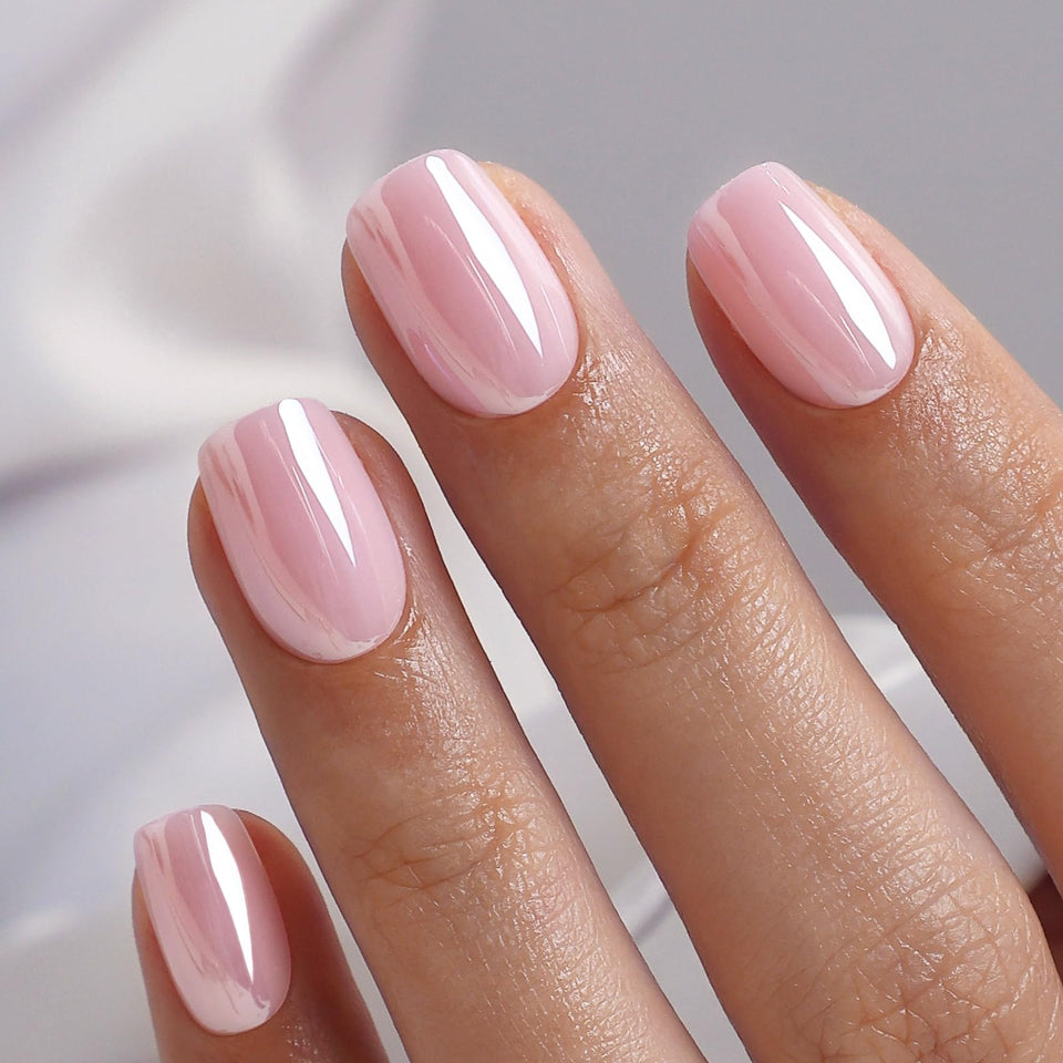 SHANGMENG front packaging displaying aurora light pink nails and accessories