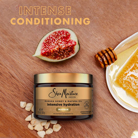 Shea Moisture being applied to curly hair improving detangling and moisture