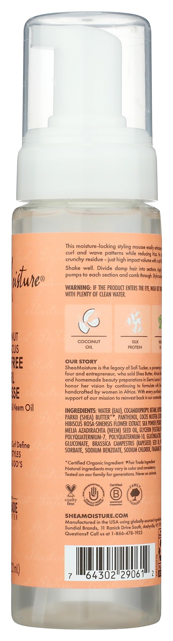 Applying Shea Moisture mousse to wet curls to boost definition