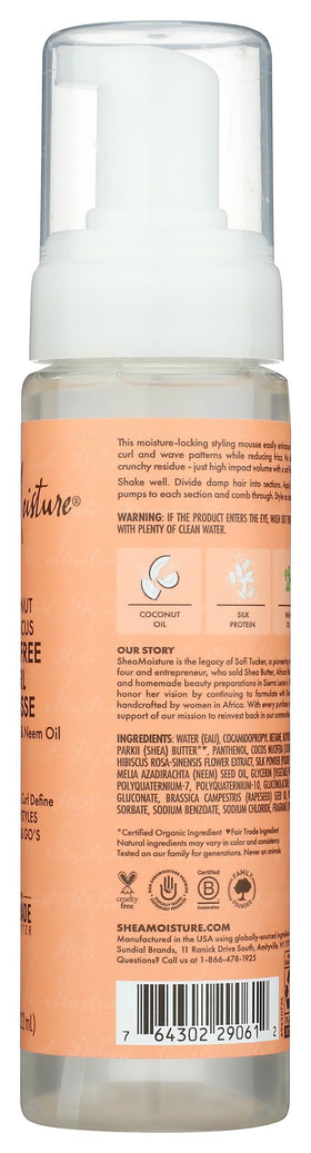 Applying Shea Moisture mousse to wet curls to boost definition