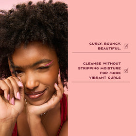 Shea Moisture bottle pictured with matching conditioner for complete routine