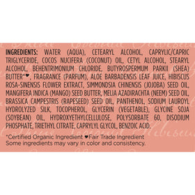 Shea Moisture 24 fl oz bottle in hand showing scale and convenient pump