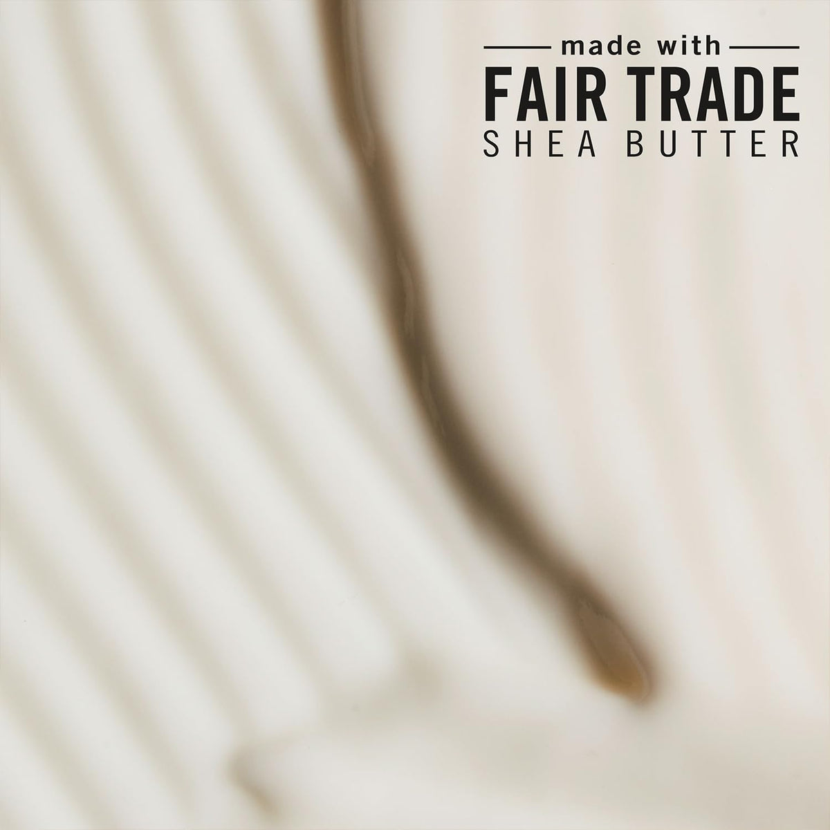 Shea Moisture bottles held in hand illustrating 24 oz scale and value