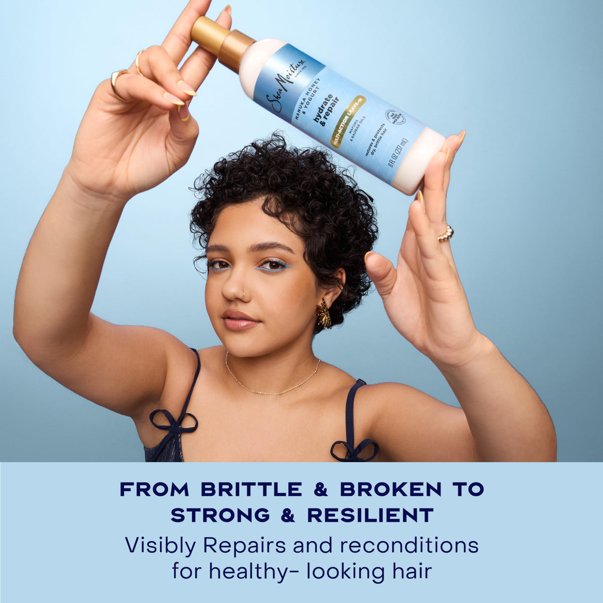 Shea Moisture being sprayed on damp hair to detangle and prep for styling