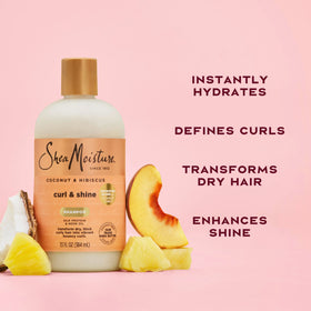 SheaMoisture 13 oz bottle in hand showing true size and convenience