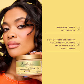 SheaMoisture applied to curly hair in shower illustrating deep conditioning step