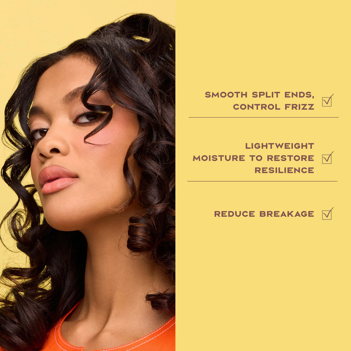 Shea Moisture applying leave-in to damp curls for easier detangling