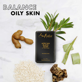 SheaMoisture bar held in hand illustrating size and travel-friendly convenience