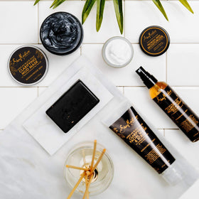 Shea Moisture bottle on bathroom shelf lifestyle showing daily routine fit