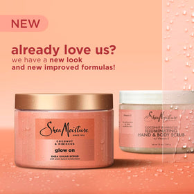 SheaMoisture jar beside hand for size comparison showing travel-friendly portion