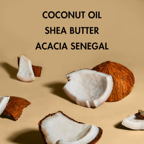 Shea Moisture oil dropping from bottle to show controlled dispense and easy use