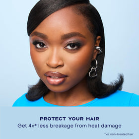 SheaMoisture applied to damp hair, demonstrates protection before styling