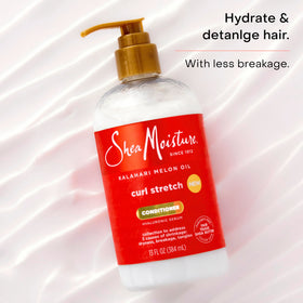 SheaMoisture applied to wet curls demonstrating detangling benefit