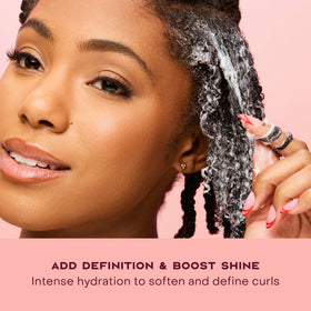 SheaMoisture product label highlighting coconut, hibiscus and silk protein