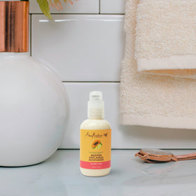 SheaMoisture jar label closeup displaying ingredient list and clean formulation