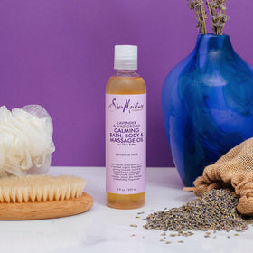 SheaMoisture oil poured into hand demonstrating fast absorption benefit