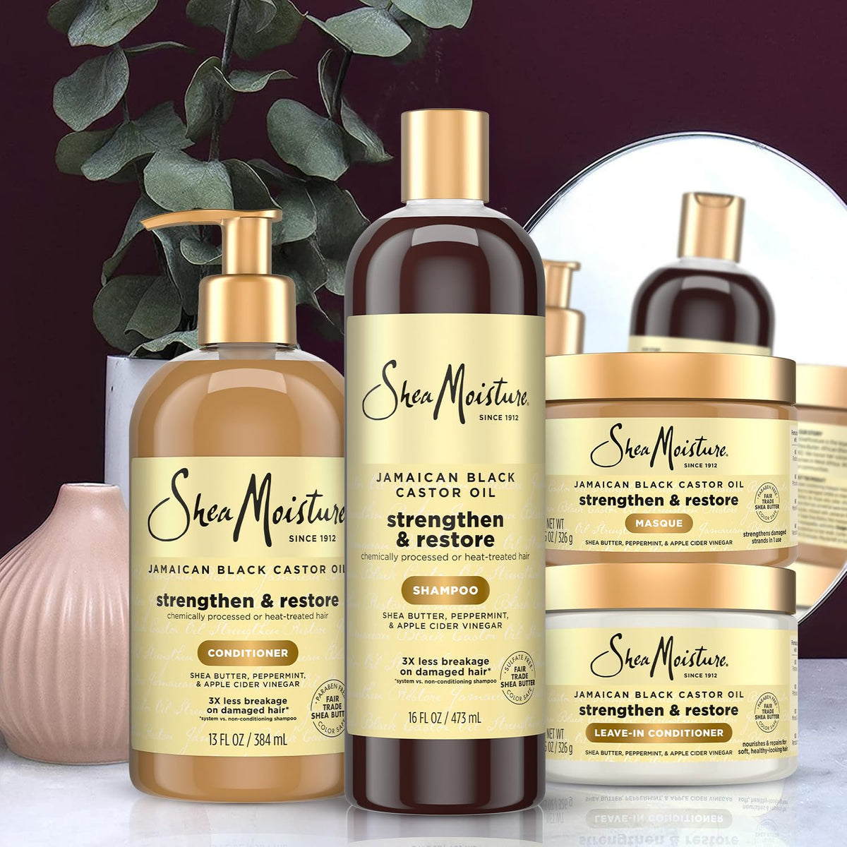 SheaMoisture leave-in conditioner being applied to damp hair for manageability