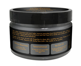 SheaMoisture applying mask to cheek, demonstrates targeted congestion control