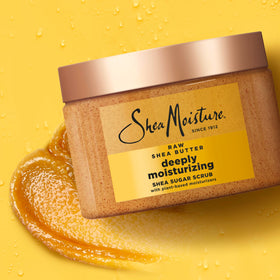 SheaMoisture spoon with scrub granules highlighting natural exfoliant blend