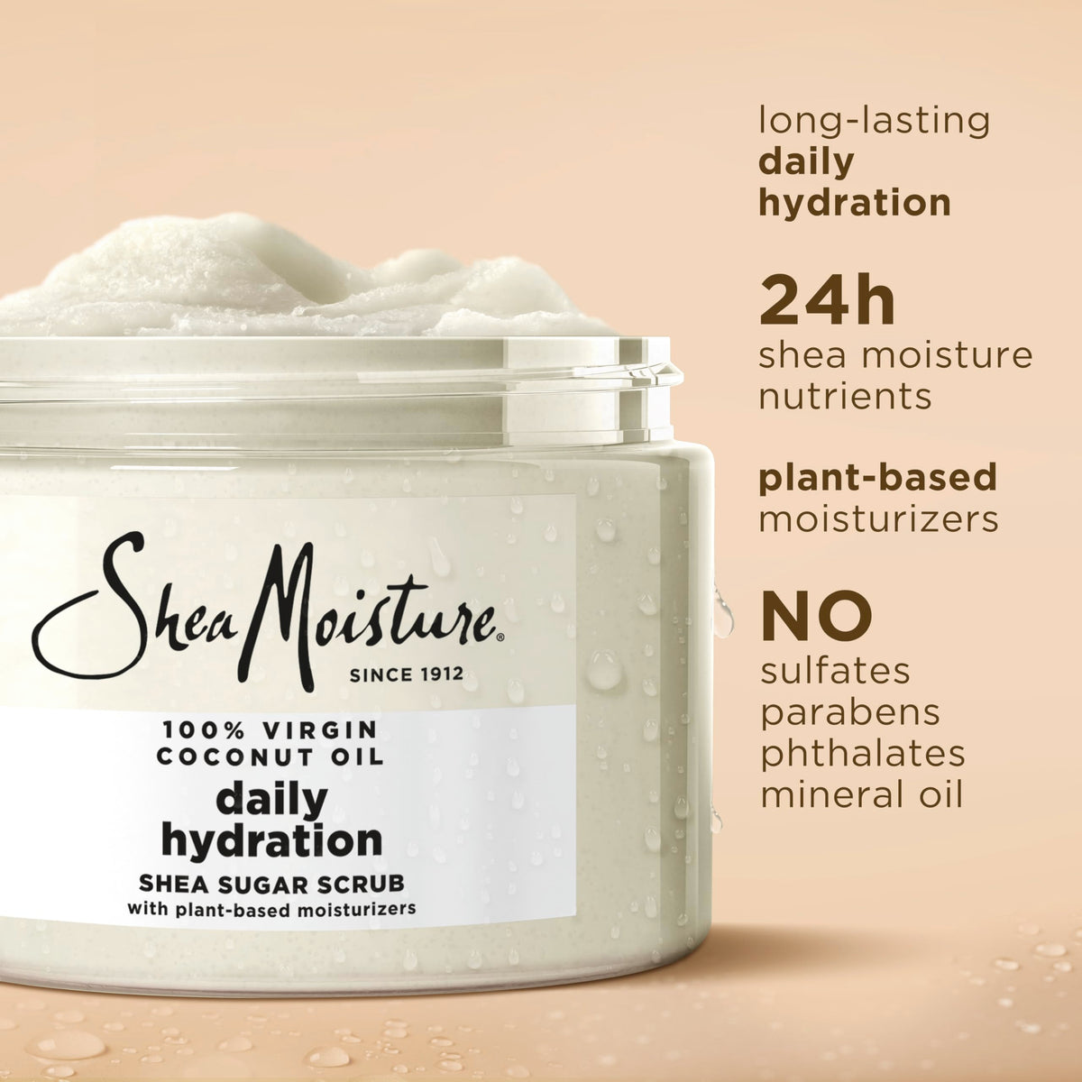 SheaMoisture being scooped and applied with hand demonstrating easy spreadability