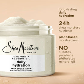 SheaMoisture being scooped and applied with hand demonstrating easy spreadability