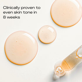 SheaMoisture serum in hand showing 1 fl oz scale and easy travel benefit
