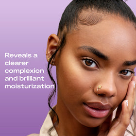 SheaMoisture bottle on bathroom counter lifestyle scene promoting daily routine benefit