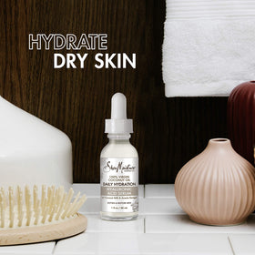 SheaMoisture serum pipette dispensing drops to highlight controlled application and minimal waste