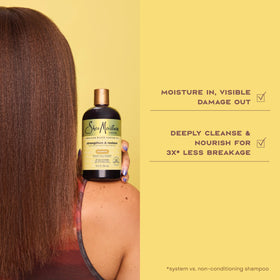 SheaMoisture shampoo in shower lathering to remove buildup