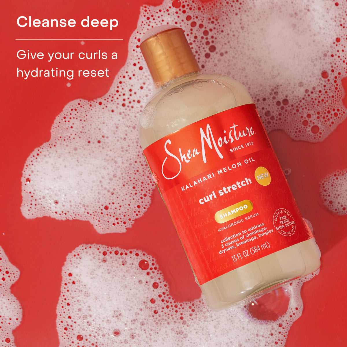 SheaMoisture shampoo applied to wet Type 4 curls for easier detangling
