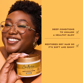 SheaMoisture jar next to hand illustrating 11.5 oz size and ease of use