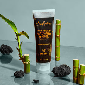 SheaMoisture next to ruler showing 4 oz size for scale and travel convenience